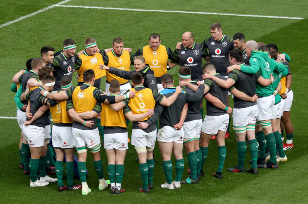 Joe Schmidt talks to his players before the game