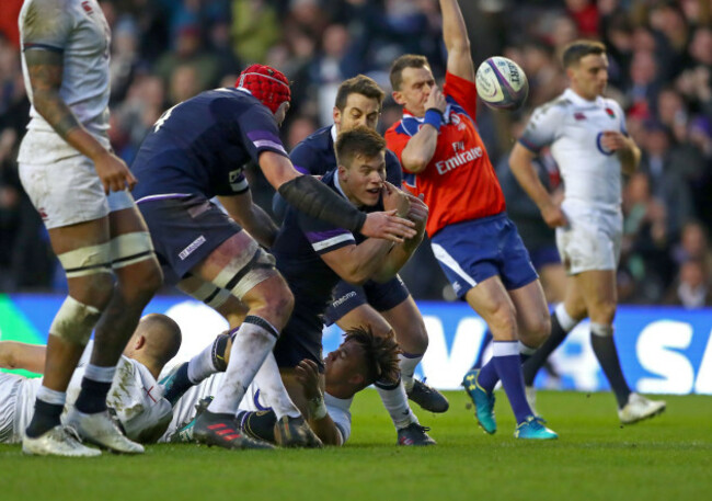 Huw Jones celebrates his try with Grant Gilchrist and Greig Laidlaw