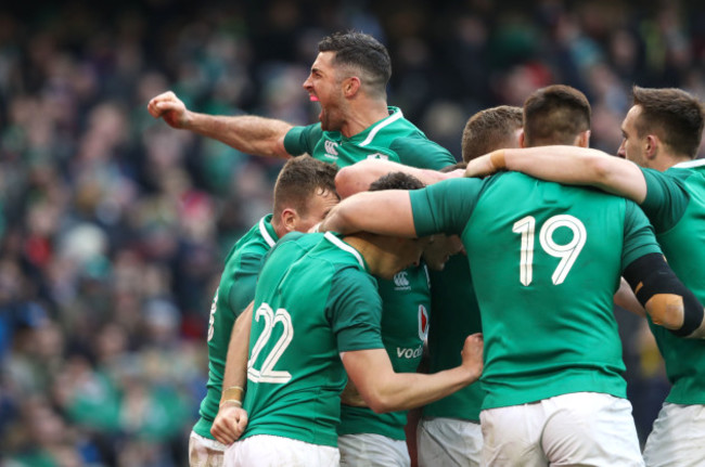 Rob Kearney celebrates with teammates Jacob Stockdale's second try