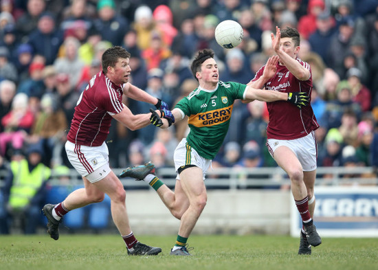 Paul Murphy under pressure from Gareth Bradshaw and Johnny Heaney