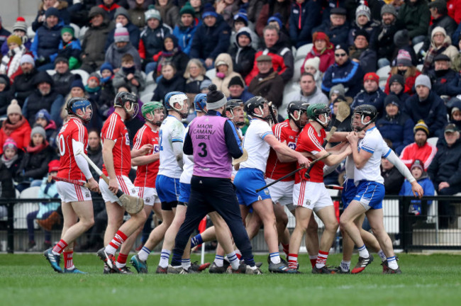 Both teams scuffle during the game