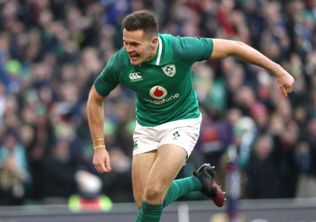 Jacob Stockdale celebrates after scoring his second try