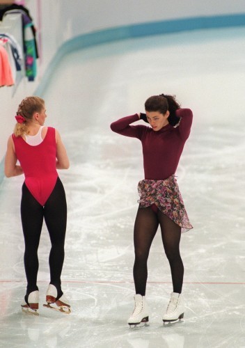 Tonya Harding (L) of the United States stands next