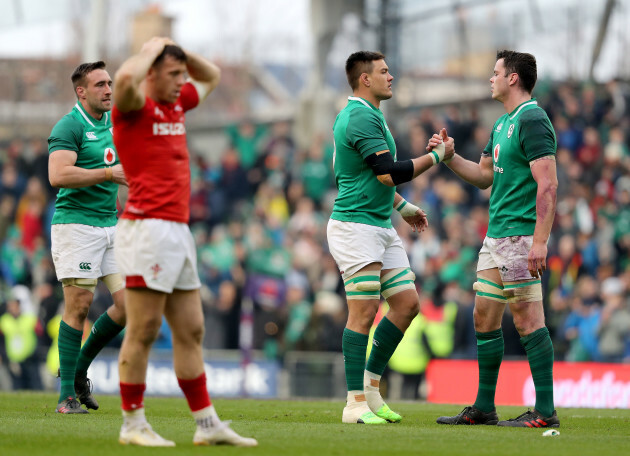 Jack Conan, Quinn Roux and James Ryan celebrate after the game