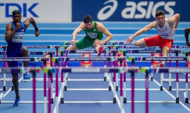 Ben Reynolds on his way to finishing 7th in the Men's 60m Hurdle Heat 2