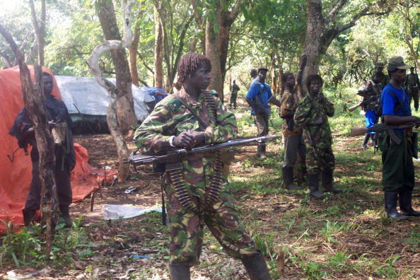 Rebel fighters of Uganda's Lord's Resistance Army gather to