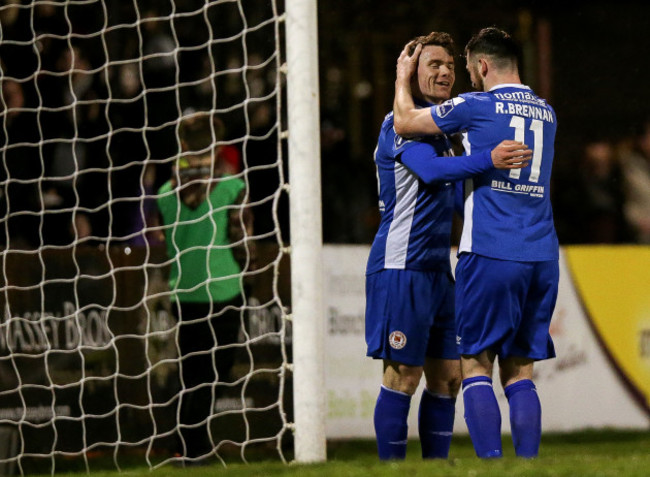 Dean Clarke celebrates scoring his sides first goal with Ryan Brennan