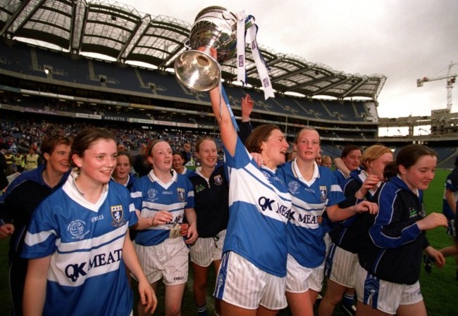 The Laois team parade the trophy