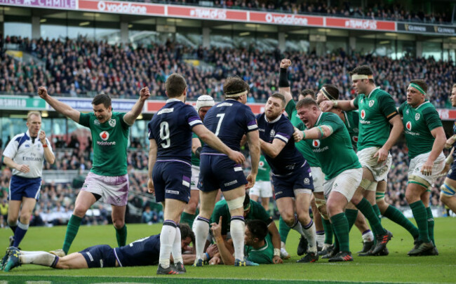 Johnny Sexton celebrates as Conor Murray scores a try