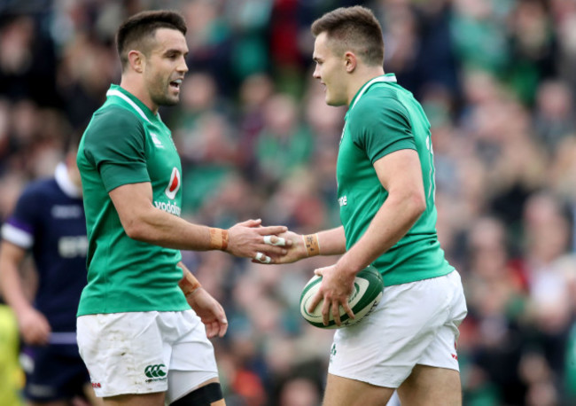 Jacob Stockdale celebrates scoring their first try with Conor Murray