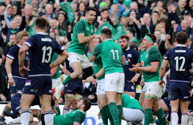 Sean Cronin celebrates scoring his sides bonus point try with Conor Murray and Jacob Stockdale