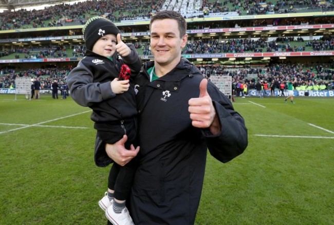 Jonathan Sexton celebrates winning with his son Luca