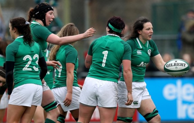 Paula Fitzpatrick celebrates scoring a try