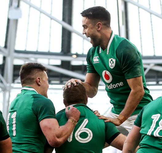Jacob Stockdale and Conor Murray celebrate with try scorer Sean Cronin