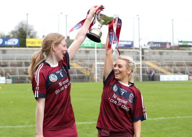 Aoife Ni Chaiside and Clare McGrath celebrate with the cup