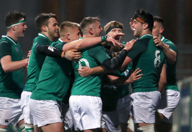 Jack O&rsquo;Sullivan celebrates scoring a try with teammates