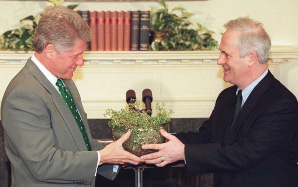 US President Bill Clinton (L) receives a tradition