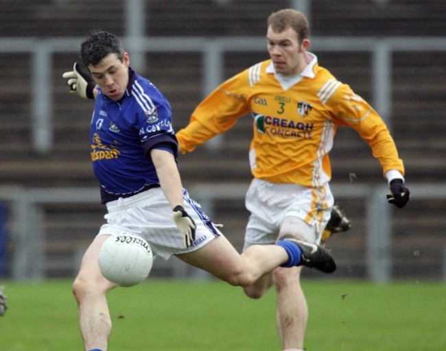 Sean McVeigh look on as Paddy Gumley scores a goal