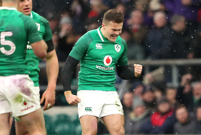 Jacob Stockdale celebrates scoring a try