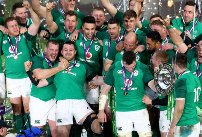 The Ireland team celebrate winning the grand slam