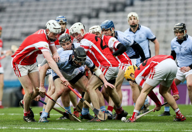 Players from both sides compete for the ball