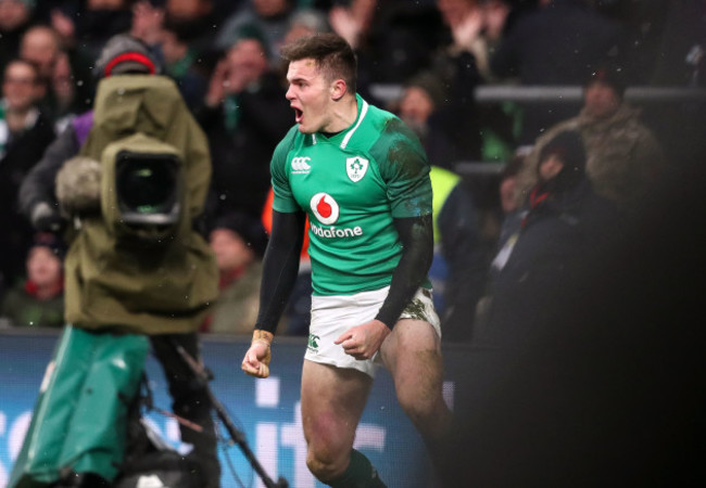 Jacob Stockdale celebrates scoring their third try