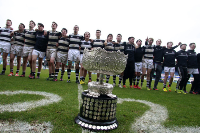 The Belvedere College squad sing with their fans after winning