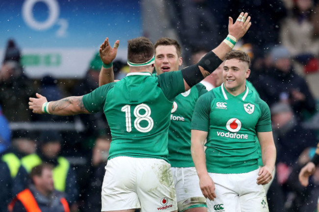 Andrew Porter, CJ Stander and Jordan Larmour celebrate after the game