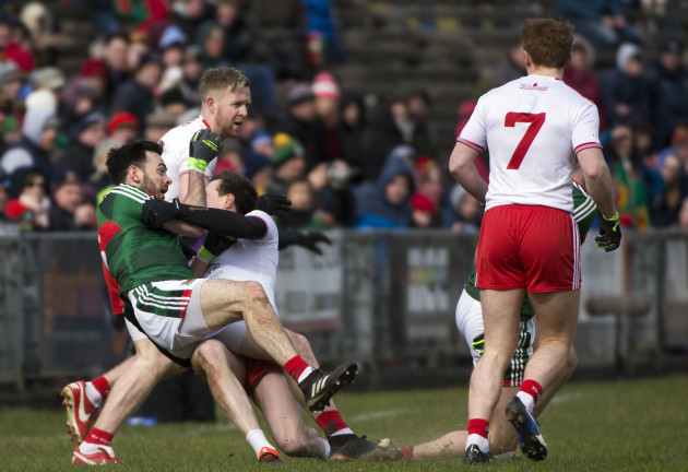 Tom Parsons is pulled to the ground by Colm Kavanagh earning the Tyrone man a black card