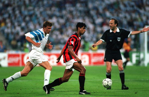 Football. UEFA Champions League Final. Munich, Germany. 26th May 1993. Marseille 1 v AC Milan 0. AC Milan's Frank Rijkaard is watched by Marseille's Frank Sauzee.