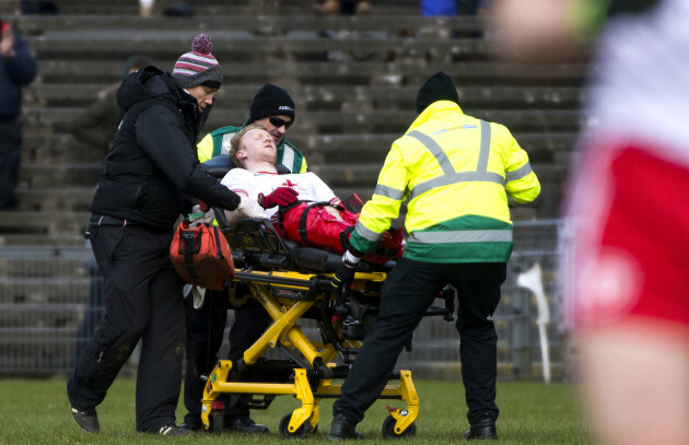 Hugh Pat Mcgeady leaves the field on a stretcher