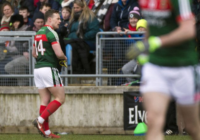 Andy Moran heads for the dressing room following a a black card