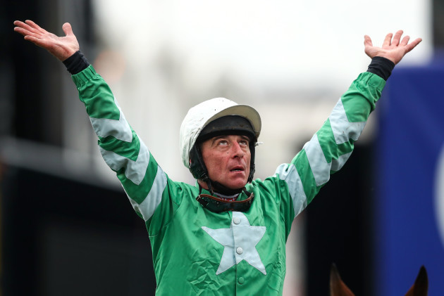 Davy Russell onboard Presenting Percy celebrates winning