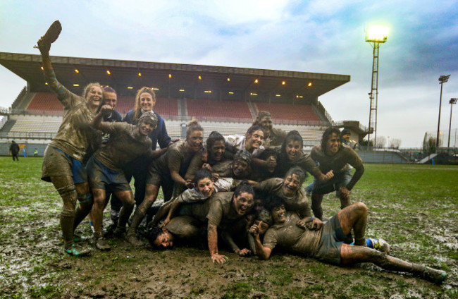 The Italy team celebrate winning