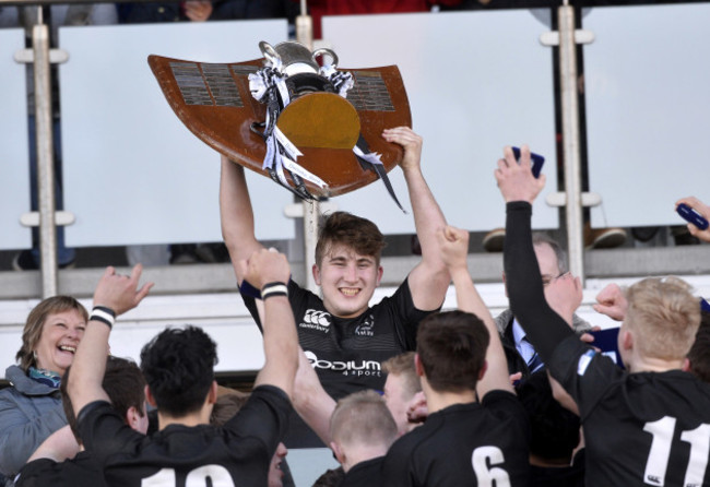 John McKee lifts the trophy