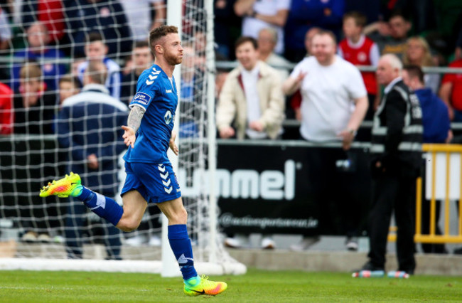 Lee-J Lynch celebrates scoring the first goal of the game