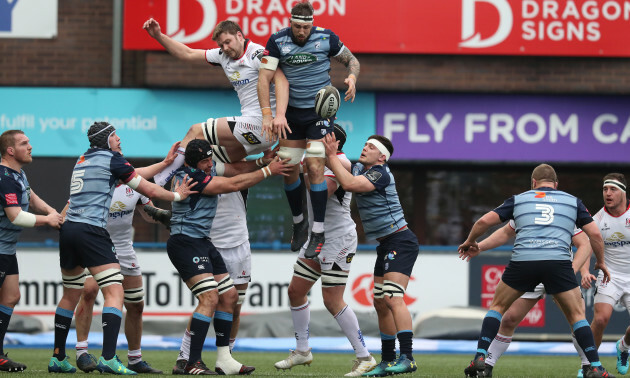 Josh Turnbull claims a line out ahead of Iain Henderson