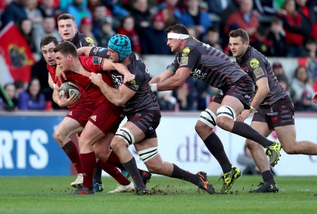 Ian Keatley is tackled by Tadhg Beirne