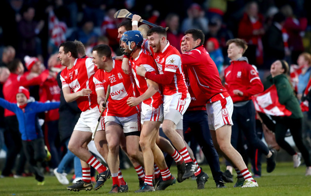 Cuala players celebrate at the final whistle