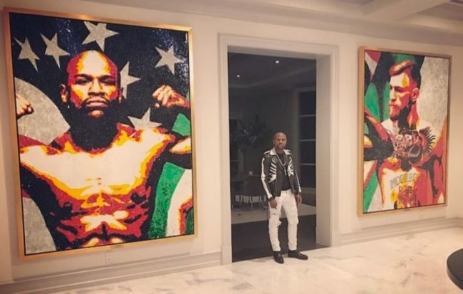 floyd-mayweather-celebrates-win-glass-portraits-conor-mcgreog-1506529875