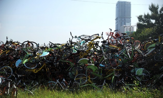 Thousands of share bikes detained in a sports field