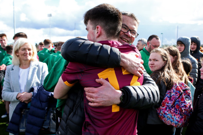 Ruairi McConville celebrates with his father