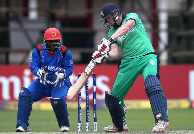 Mohammad Shahzad looks on as Kevin O’Brien scores runs