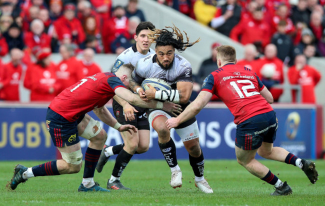 Ma'a Nonu tackled by Jack O'Donoghue and Rory Scannell