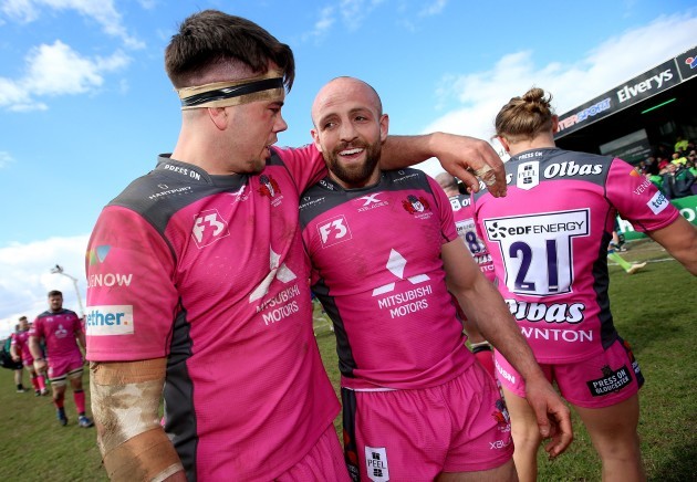 Lewis Ludlow celebrates after the game with Charlie Sharples
