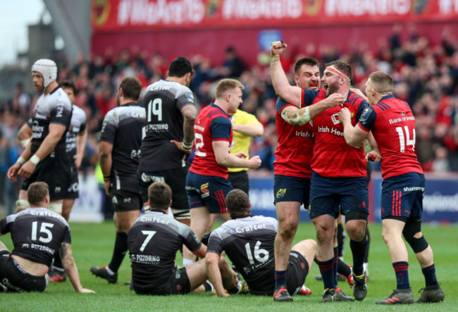 Niall Scannell, James Cronin and Andrew Conway celebrate at the end of the game