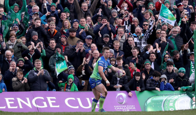 Matt Healy celebrates scoring a try