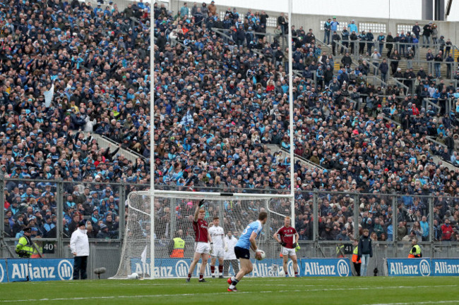 Dean Rock kicks the last point of the game