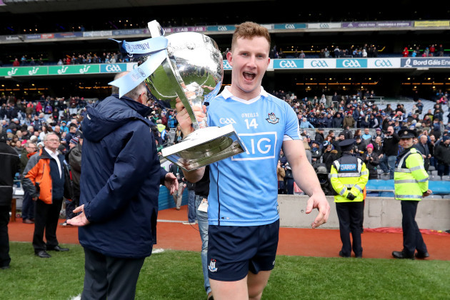 Ciarán Kilkenny celebrate after the game with teh division one trophy