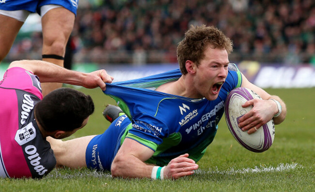 Kieran Marmion celebrates scoring a try
